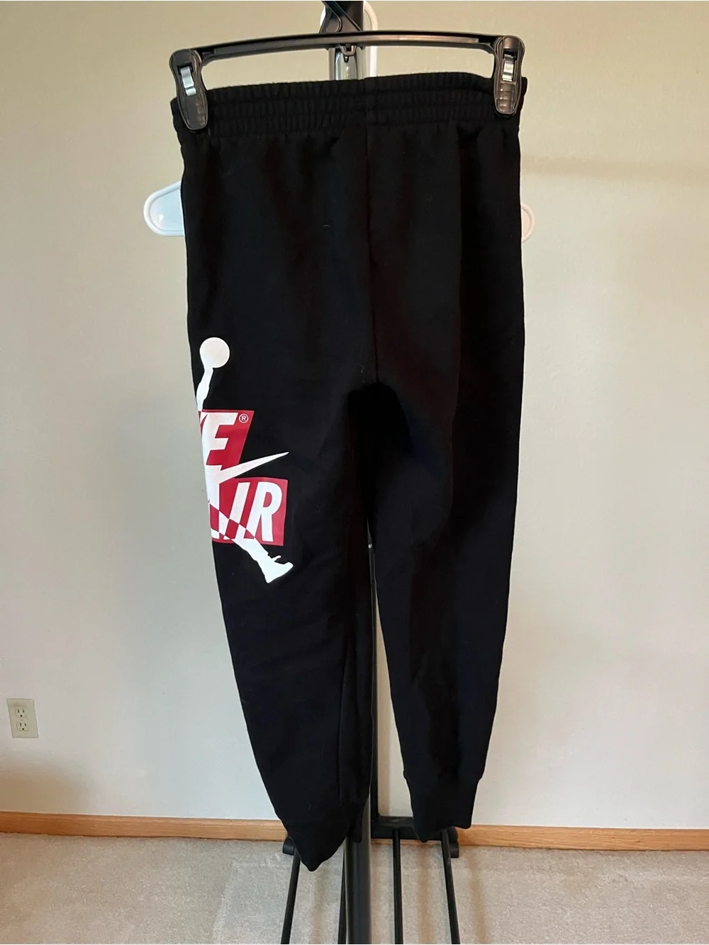 Nike Kids Black Sweatpants with Red & White Logo